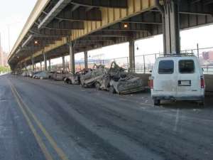 Cars along FDR drive were randomly toasted. These cars are at least 1_2 mile away from the WTC
