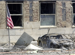 A U.S. flag is set outside the pentagon after a highjacked commercial jetliner crashed into it, Sept 11, 2001.  The pentagon attack followed an attack on the twin towers of the New York World Trade Center in what is being called the worst terrorist attack in history. (U.S. Air Force photo by TSgt Jim Varhegyi)(Released)